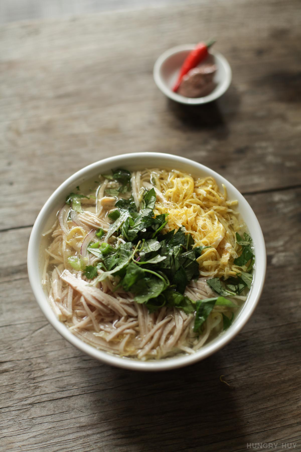 Vietnamese Bun Thang noodle soup (with julienned egg, pork sausage and chicken)